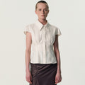 KIMZISU Double-Button Cap Sleeve Shirt_IVORY