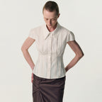 KIMZISU Double-Button Cap Sleeve Shirt_IVORY