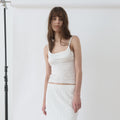 NOTHINGEVERYTHING CLASSIC SLEEVELESS TOP IN GLOSSY WHITE