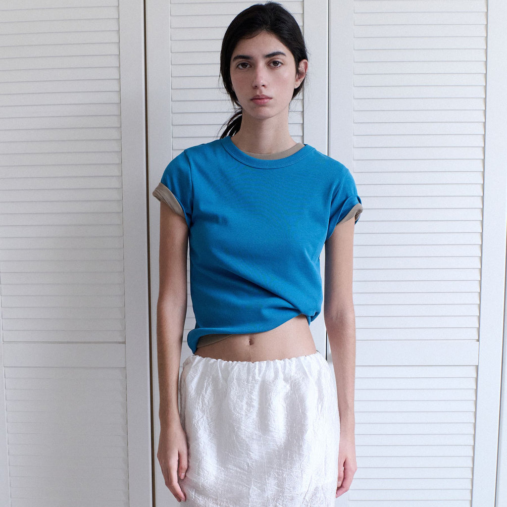 ANDNEEDS Bessette half tee (blue)