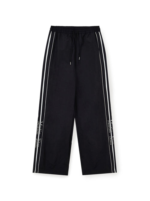 MATIN KIM MATIN KIM Wide Track Pants