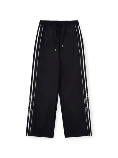 MATIN KIM Wide Track Pants