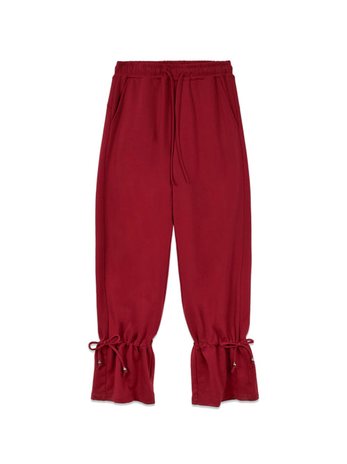 MATIN KIM MATIN KIM STRING DETAIL SWEATPANTS in Red