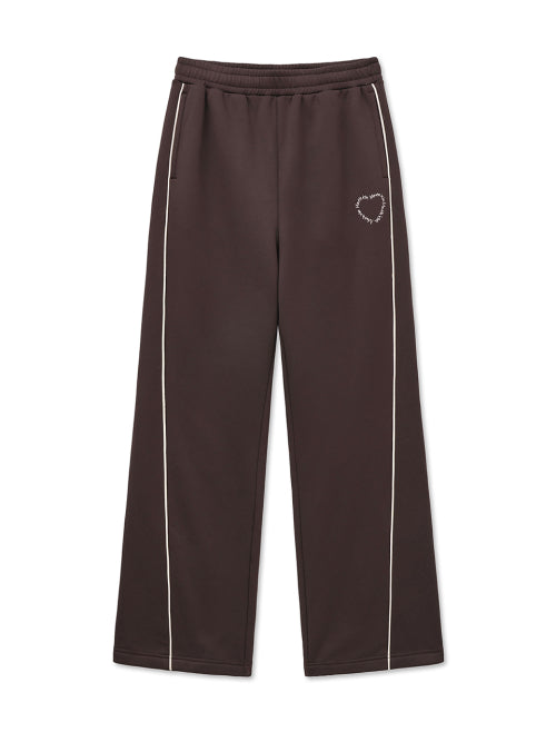 MATIN KIM MATIN KIM Heart Logo Track Pants in Brown
