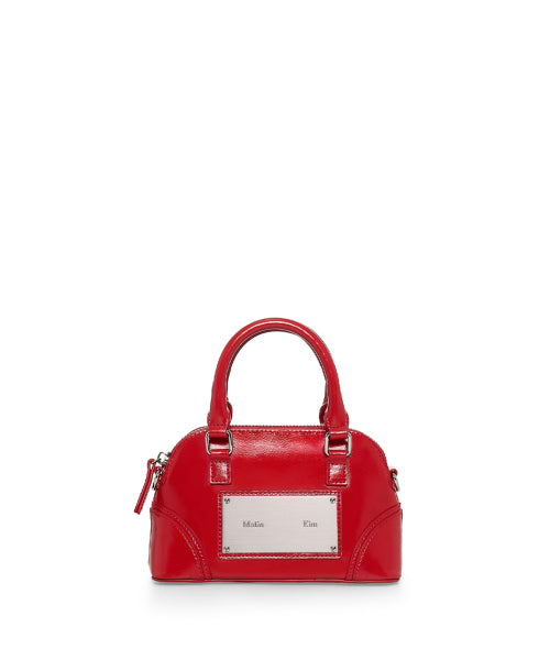 MATIN KIM MATIN KIM CURVE ZIP MINI BAG
