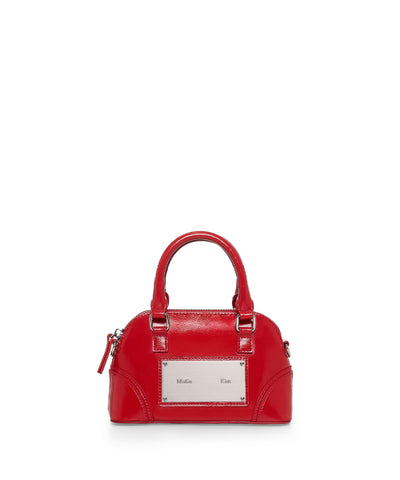 MATIN KIM CURVE ZIP MINI BAG