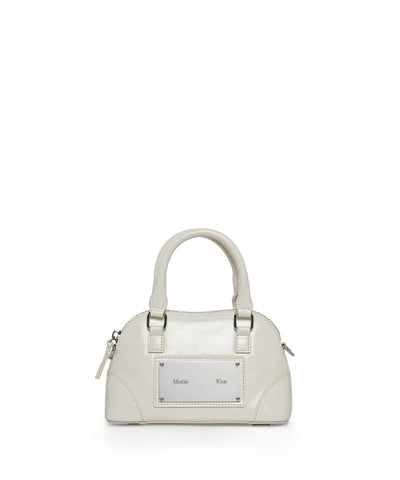 MATIN KIM CURVE ZIP MINI BAG in Light Grey
