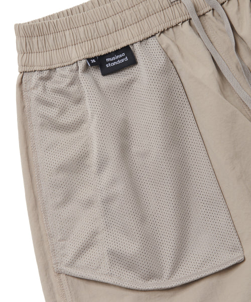 MUSINSA STANDARD WOMAN MUSINSA STANDARD WOMAN Women's Nylon Banding Shorts Light Beige