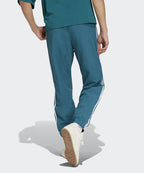 ADIDAS ADIDAS Woven Firebird Track Pants - Blue Green