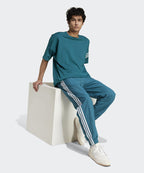 ADIDAS ADIDAS Woven Firebird Track Pants - Blue Green