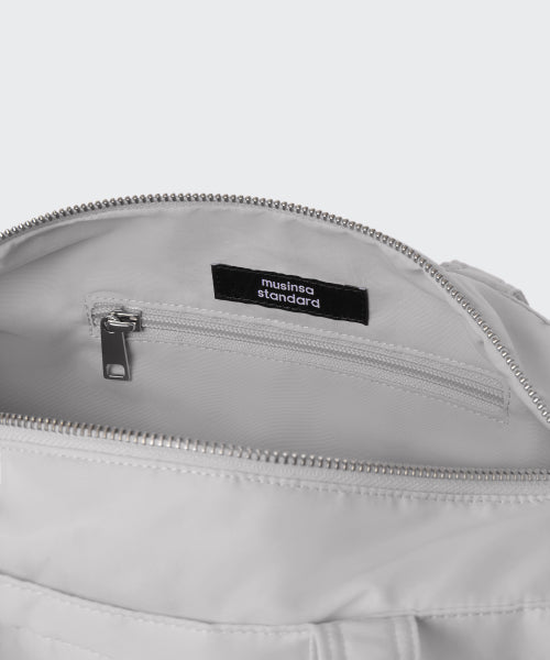 MUSINSA STANDARD WOMAN MUSINSA STANDARD WOMAN Women's Nylon Cylinder Bag [Light Gray]