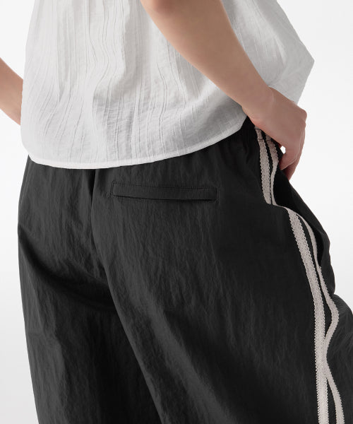 MUSINSA STANDARD WOMAN MUSINSA STANDARD WOMAN Women's Nylon Wide Race Track Pants [Black]