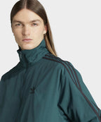 ADIDAS ADIDAS Woven Firebird Track Top - Aura Ivy