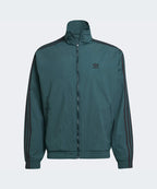 ADIDAS ADIDAS Woven Firebird Track Top - Aura Ivy
