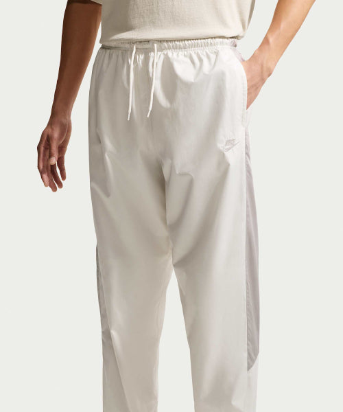 NIKE NIKE Wind Runner Pants M - Light Iron Ore