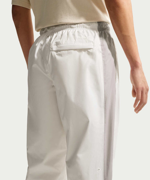 NIKE NIKE Wind Runner Pants M - Light Iron Ore