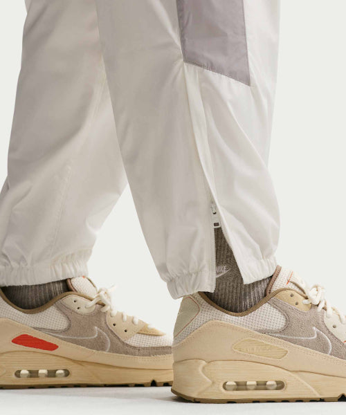 NIKE NIKE Wind Runner Pants M - Light Iron Ore