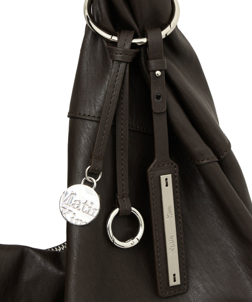 MATIN KIM MATIN KIM TWIST HANDLE LARGE HOBO BAG