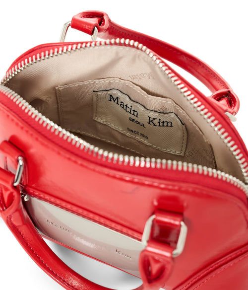 MATIN KIM MATIN KIM CURVE ZIP MINI BAG
