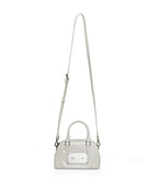 MATIN KIM MATIN KIM CURVE ZIP MINI BAG in Light Grey