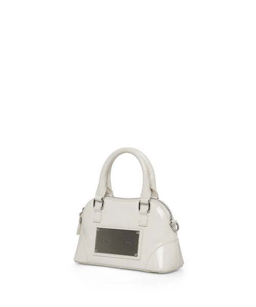 MATIN KIM MATIN KIM CURVE ZIP MINI BAG in Light Grey